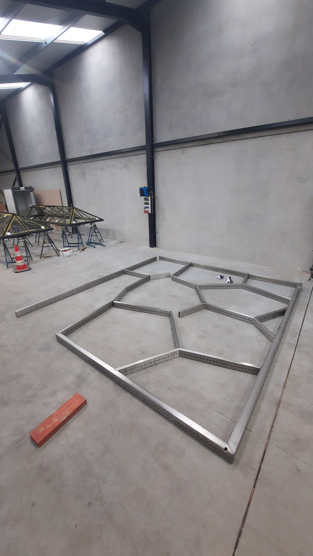 Voronoi frame laid out on the workshop floor for a check