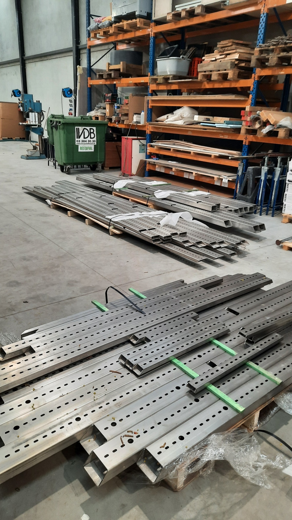 Stainless steel profiles staged in the workshop