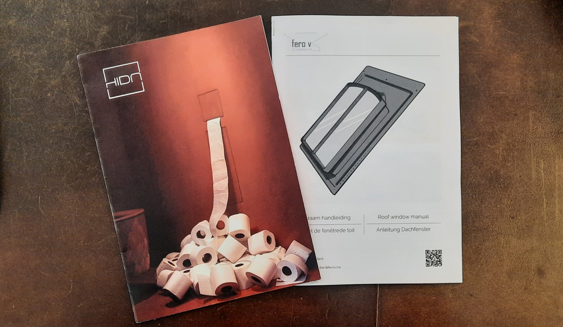 HIDN product brochure alongside Fero V roof window manual
